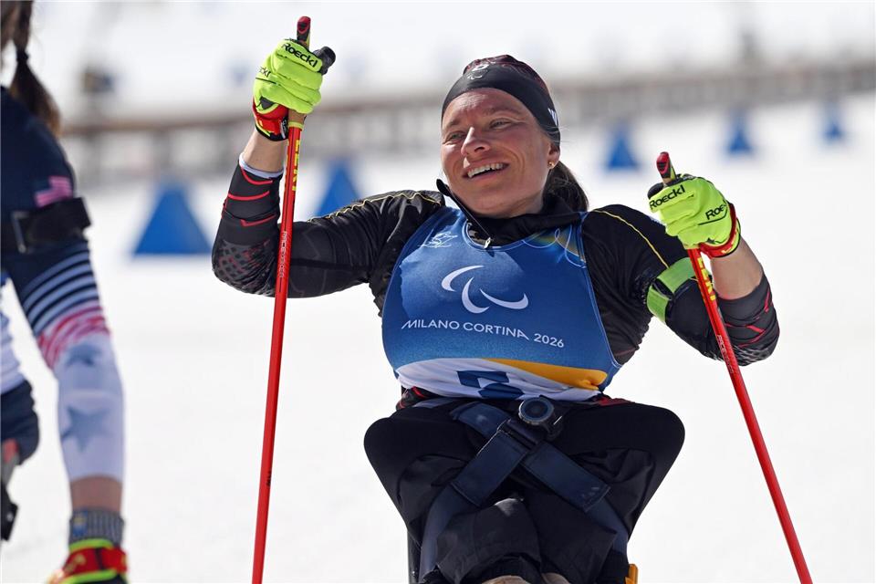 Anja Wicker kommt als Dritte in Ziel. Martin Schutt/dpa