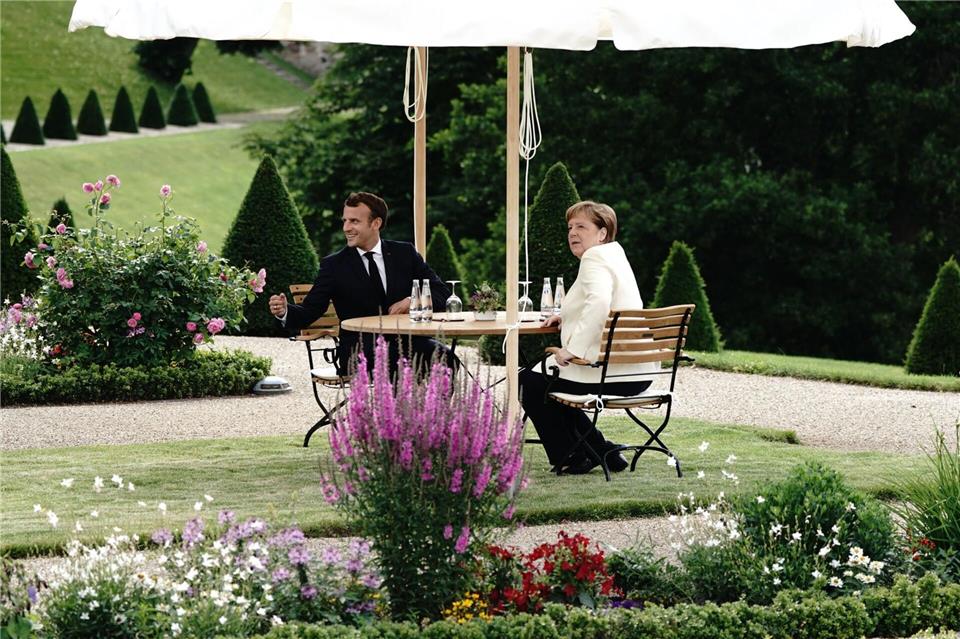 Auch Kanzlerin Merkel empfing Gäste wie Frankreichs Präsident Macron in Meseberg. (Archivbild)  Kay Nietfeld/dpa-Pool/dpa