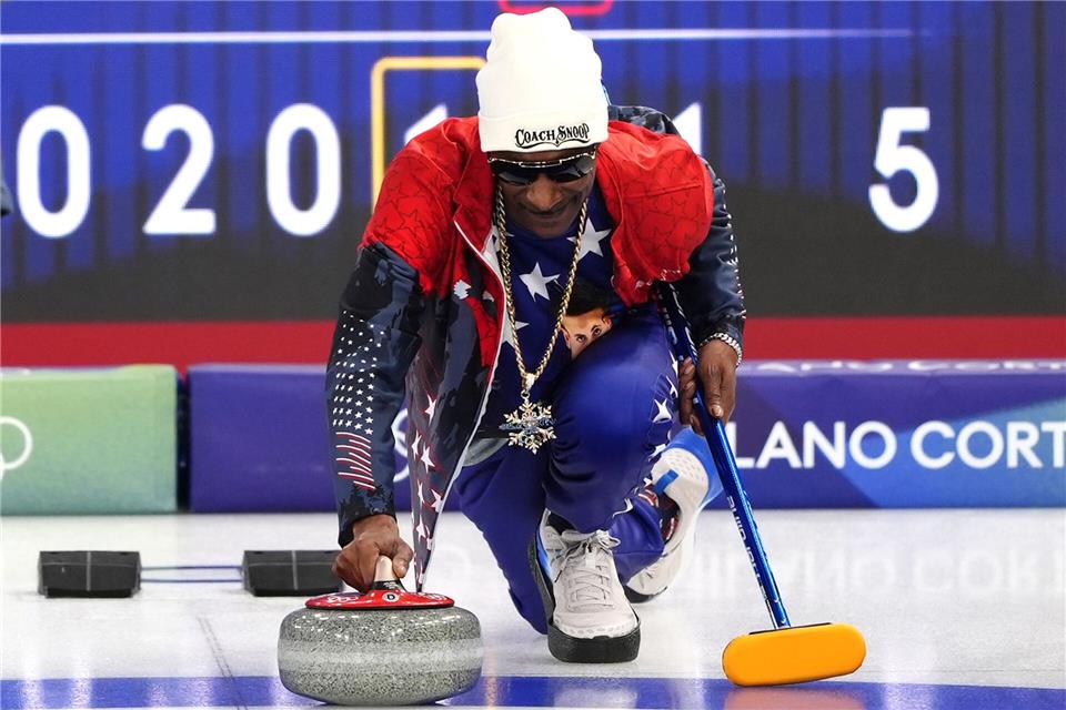Auch US-Rapper Snoop Dogg ist im Curling-Fieber. Andrew Milligan/PA Wire/dpa
