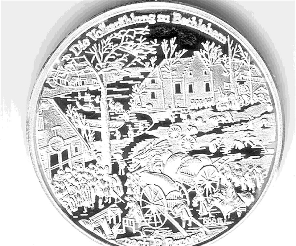 Auf der Rückseite wird die Volkszählung zu Bethlehem abgebildet.