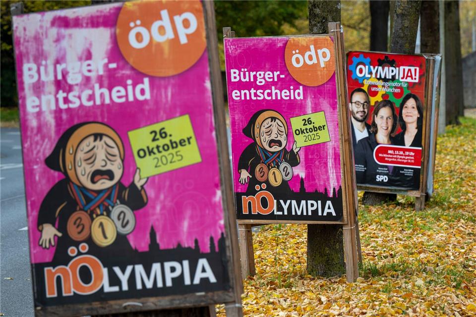 Befürworter und Gegner werben mit Plakaten in München vor dem Olympia-Bürgerentscheid.Peter Kneffel/dpa