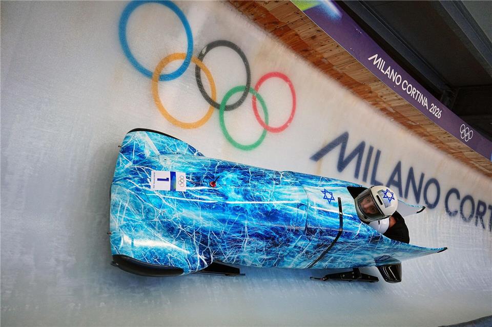 Bob-Pilot Adam Edelmann reagiert gelassen auf einen TV-Kommentar aus der Schweiz. Michael Kappeler/dpa