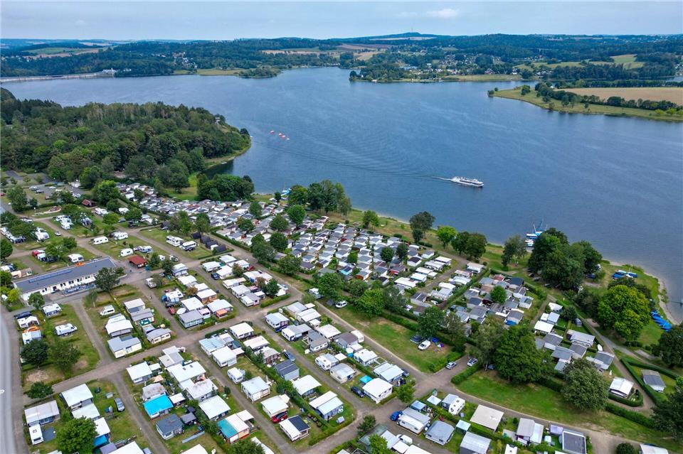 Camping in Sachsen ist beliebt, auch wenn das Wetter nicht immer mitspielt. (Archivbild)Hendrik Schmidt/dpa
