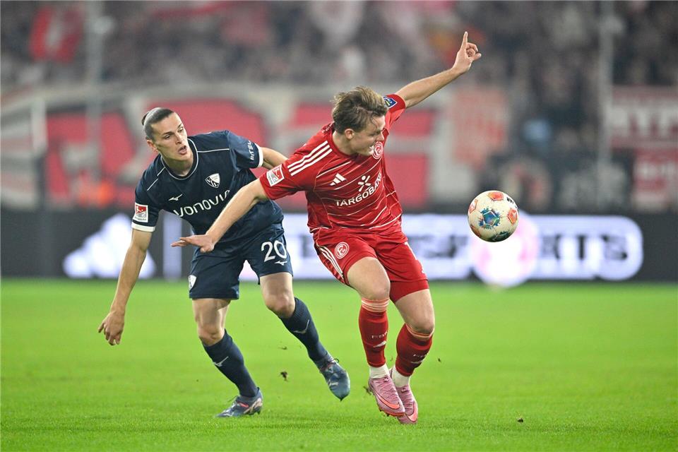 Christian Rasmussen (r) wechselt zum VfL Bochum. (Archivbild)Anke Waelischmiller/dpa