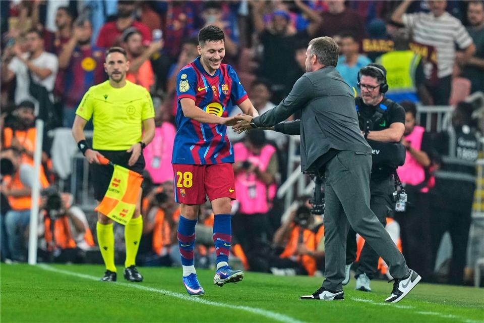 Da freut sich auch Trainer Flick. Altaf Qadri/AP/dpa