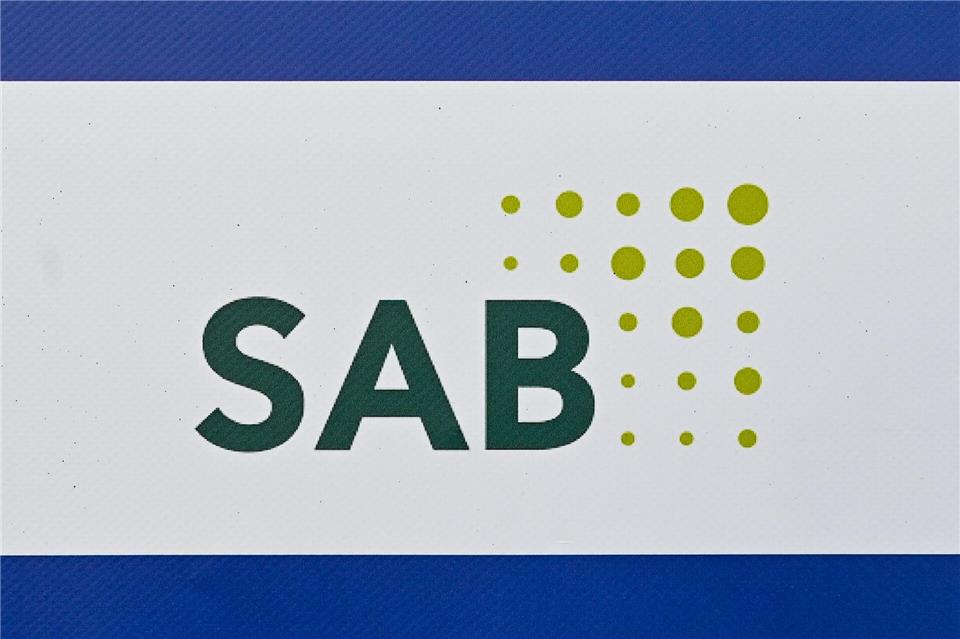 Das Logo der Sächsischen Aufbaubank. (Symbolbild)Patrick Pleul/dpa-Zentralbild/dpa