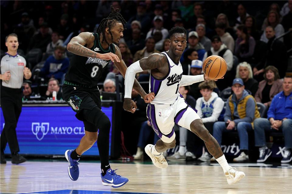 Dennis Schröder (r) erzielte 17 Punkte für die Kings, zum Sieg in Minnesota reichte es aber nicht. Matt Krohn/AP/dpa