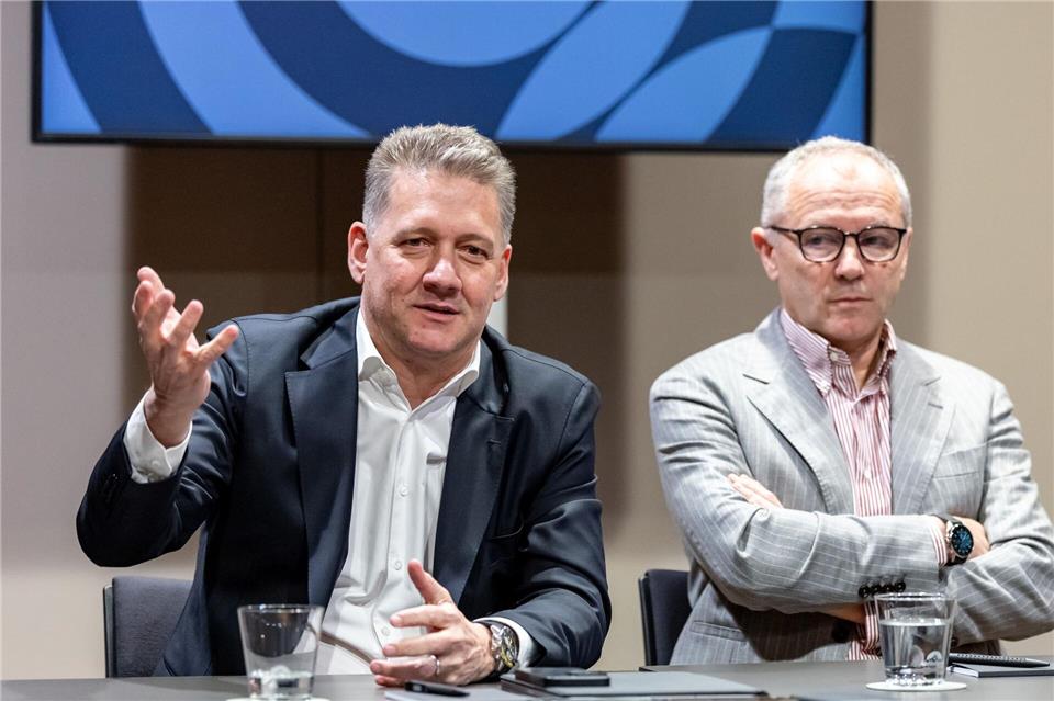 Der Audi-Boss und der Formel-1-Chef Seite an Seite.Daniel Karmann/dpa