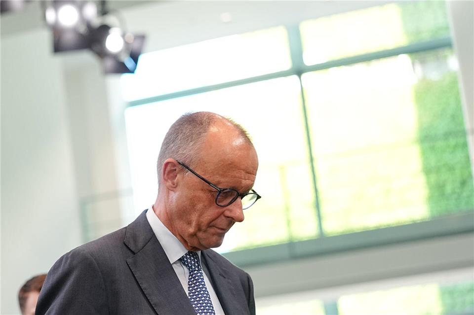 Der Bundeskanzler äußert sich nach dem WM-Aus der deutschen Mannschaft. Kay Nietfeld/dpa