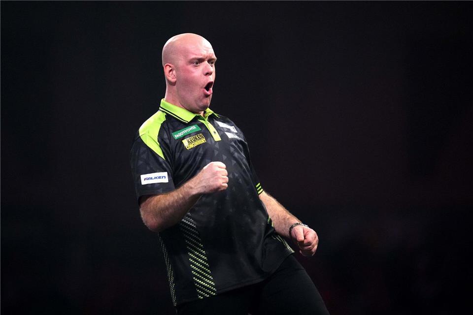 Der Niederländer Michael van Gerwen jubelt.Adam Davy/PA/AP/dpa