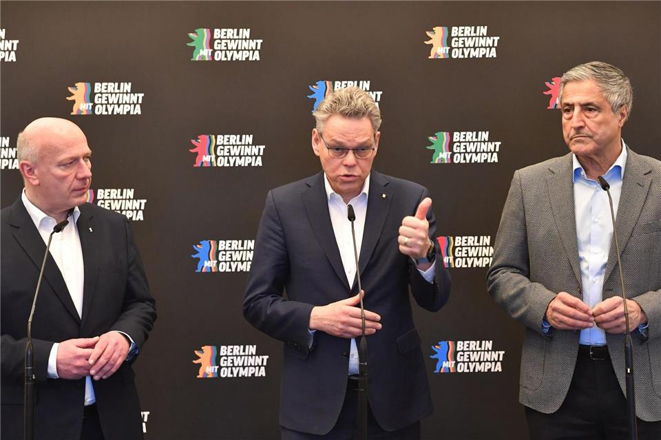 Der Regierende Bürgermeister Kai Wegner (l.) will die Olympischen Spiele nach Berlin holen. Paul Zinken/dpa