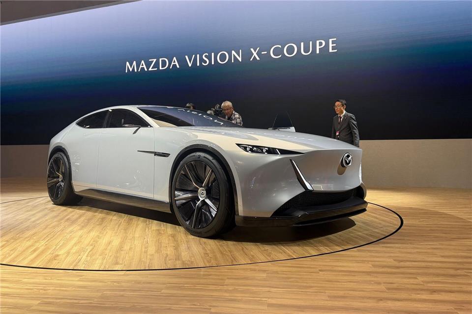 Mazda zeigt charmanten Mini und reizvollen Gran Turismo Der Vision X-Coupé setzt auf ein Plug-in-Hybridsystem mit einem Zweischeiben-Wankelmotor.Thomas Geiger/dpa-tmn