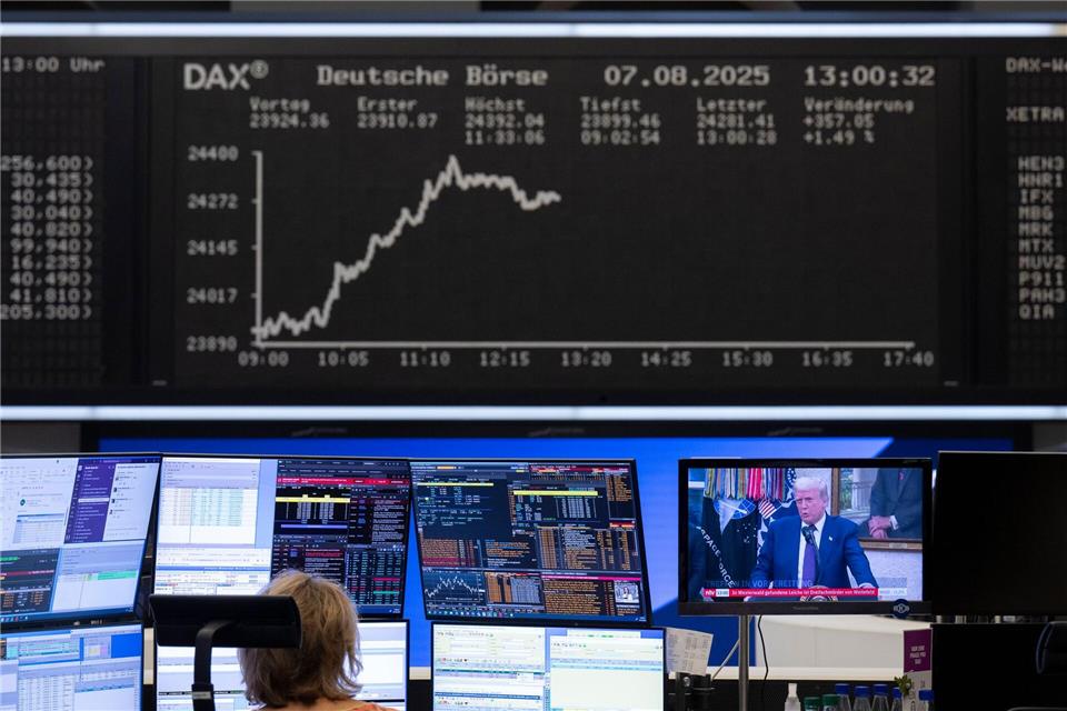 Der Zollstreit sorgt für Umsatzeinbußen, aber viele Dax-Konzerne verdienen trotzdem noch gut. (Symbolbild)Boris Roessler/dpa