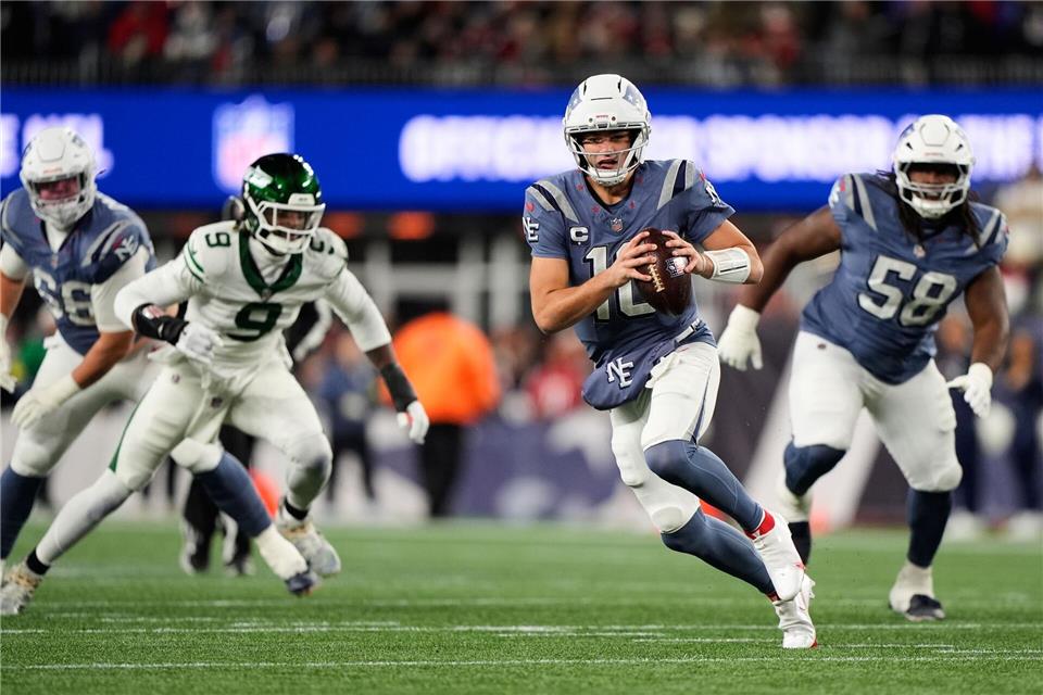 Die New England Patriots mit Quarterback Drake Maye sind in der NFL derzeit nicht zu stoppen.Robert F. Bukaty/AP/dpa
