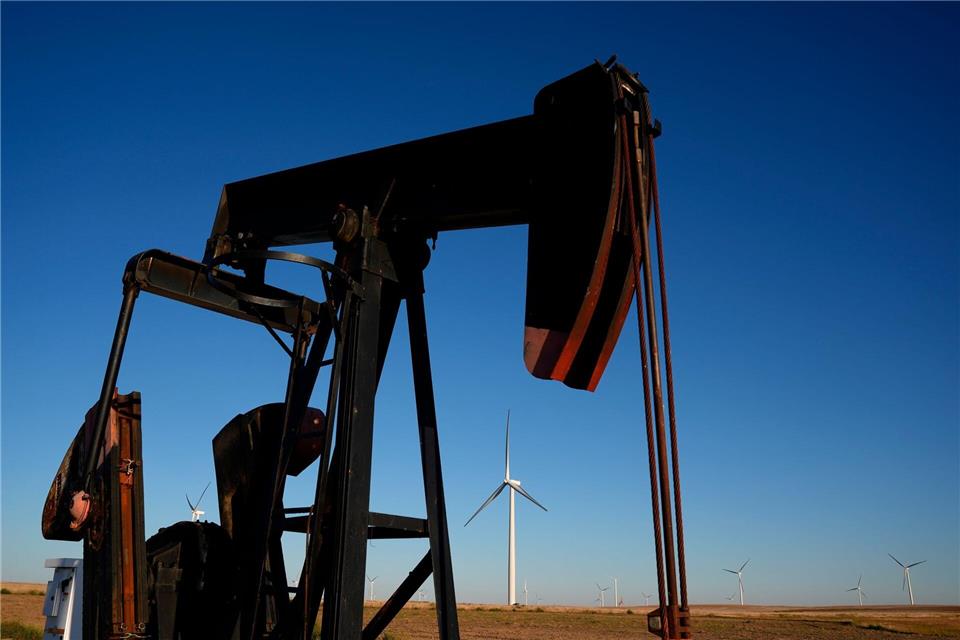 Die USA sind der größte Öl- und Gasproduzent weltweit - und befeuern auch damit die Erderwärmung.Charlie Riedel/AP/dpa