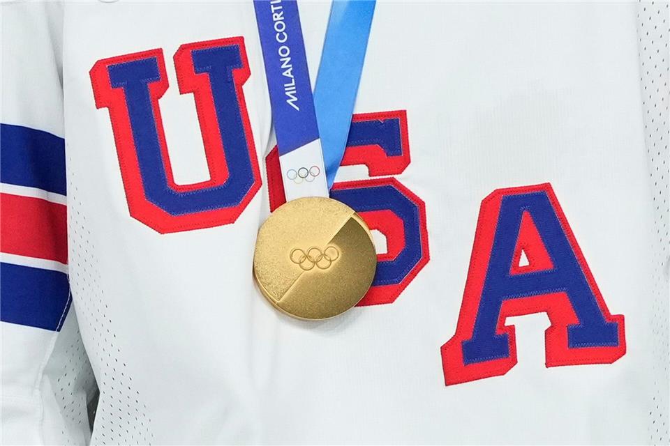 Die amerikanischen Eishockey-Spieler bezwangen Erzrivale Kanada im Olympia-Finale.Hassan Ammar/AP/dpa