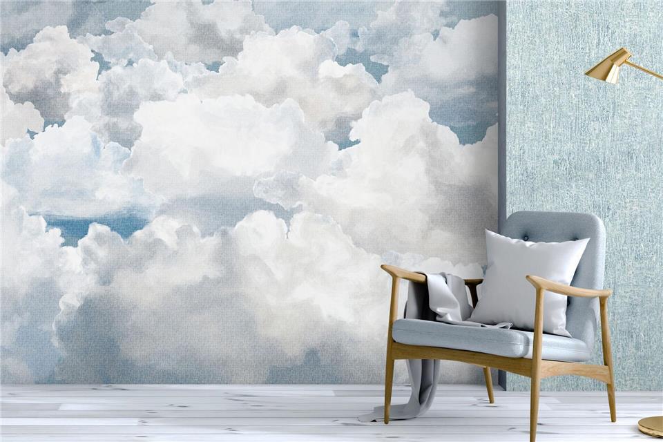 Die fließenden Farben der Aquarell-Tapete bringen Leichtigkeit und Kreativität in den Raum – ideal kombiniert mit natürlichen Materialien wie Holz.Hohenberger/DTI/dpa-tmn