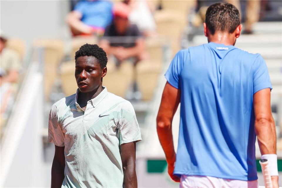 Duell der Generationen zwischen Moise Kouame (l) und Marin Cilic .Frank Molter/dpa