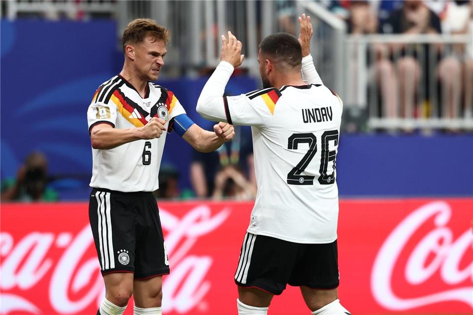 Ein typischer Joshua Kimmich beim Jubeln mit geballten Fäusten nach seiner Torvorlage für Deniz Undav.Christian Charisius/dpa