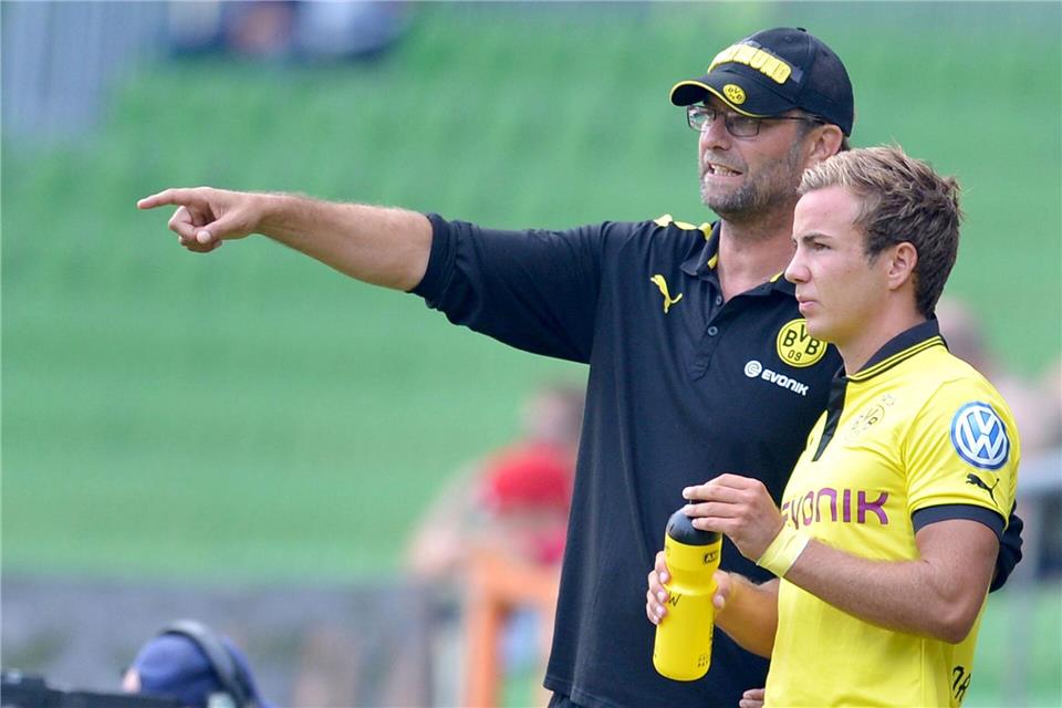 Einst erfolgreich bei Borussia Dortmund: Mario Götze (l) und Jürgen Klopp. (Archivbild)picture alliance / dpa
