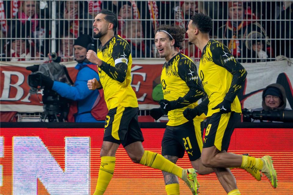 Emre Can (l) jubelt über seinen Treffer zum 1:0.Soeren Stache/dpa