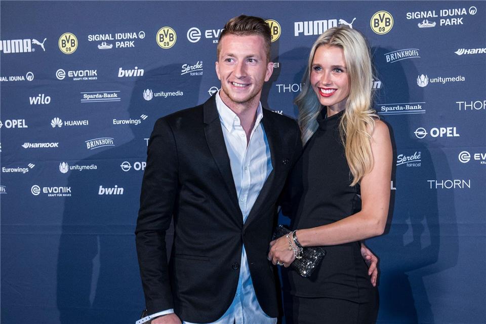 Ex-Nationalspieler Marco Reus mit Ehefrau Scarlett Gartmann. (Archivfoto) picture alliance / Paul Zinken/dpa