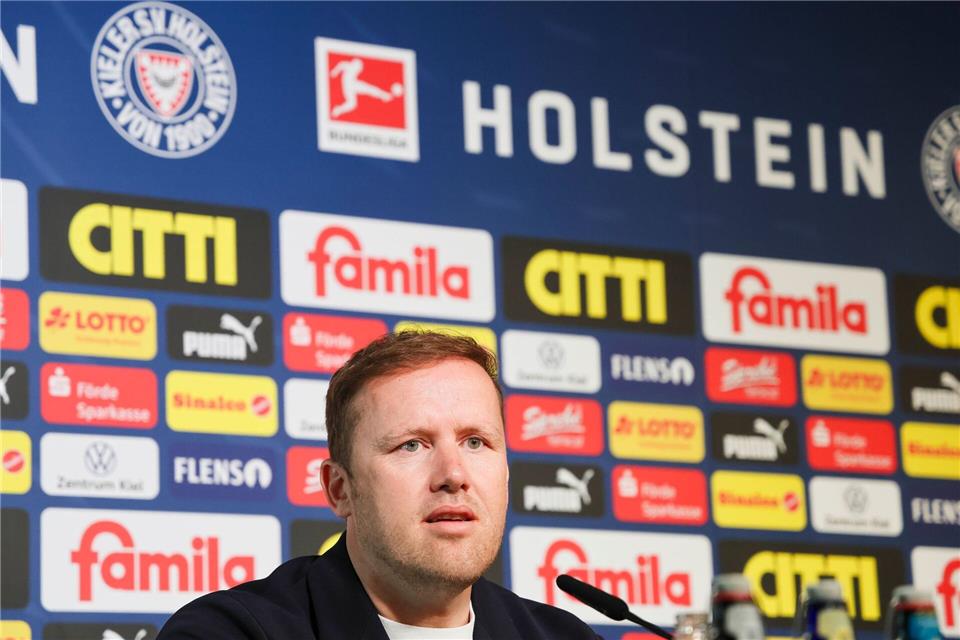 Kiel im Terminstress: Keine Rückreise nach Wolfsburg-Spiel  Früher in Wolfsburg, jetzt in Kiel: Fußball-Manager Olaf Rebbe.Frank Molter/dpa