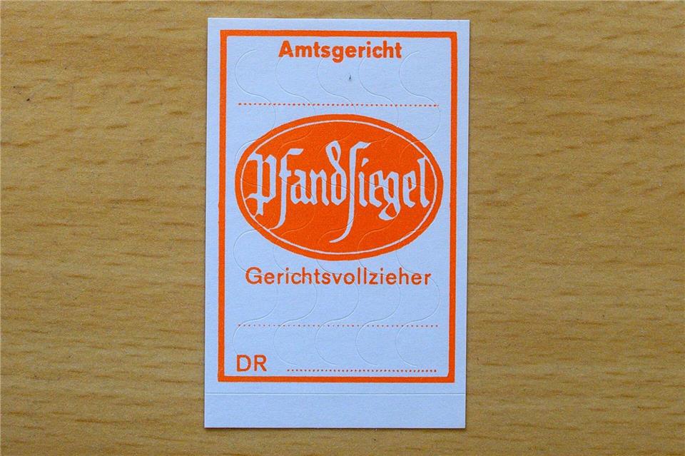 Gerichtsvollzieher nutzen Pfandsiegel, um gepfändete Wertgegenstände zu kennzeichnen. (Symbolbild)Klaus-Dietmar Gabbert/dpa