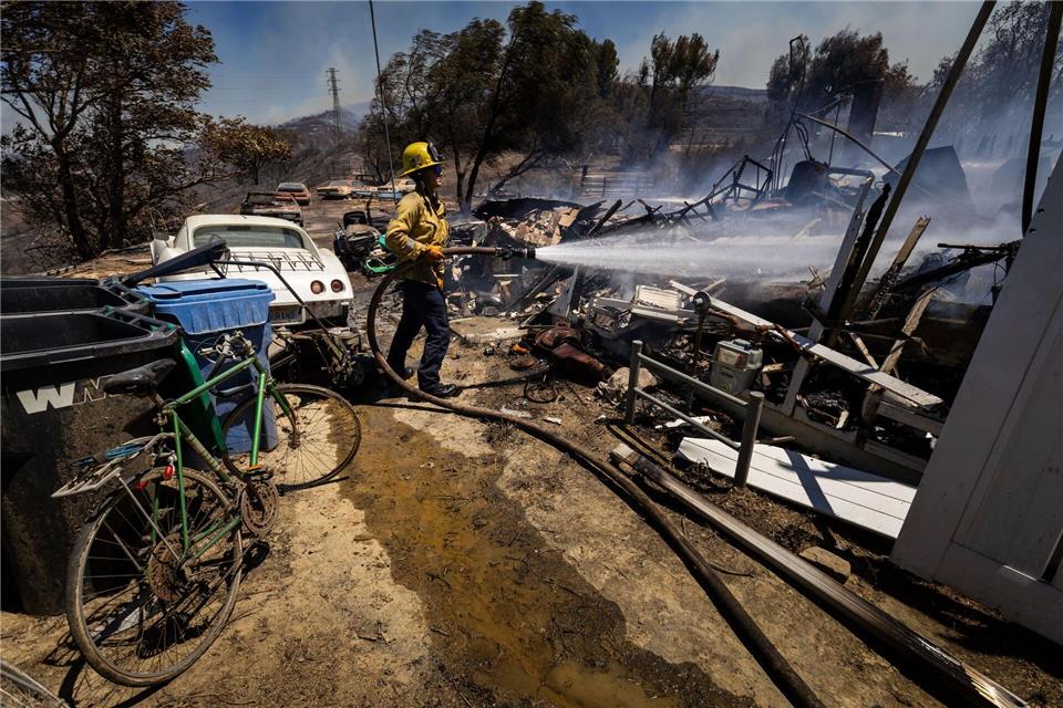 Größere Schäden konnten bisher verhindert werden. Ethan Swope/AP/dpa