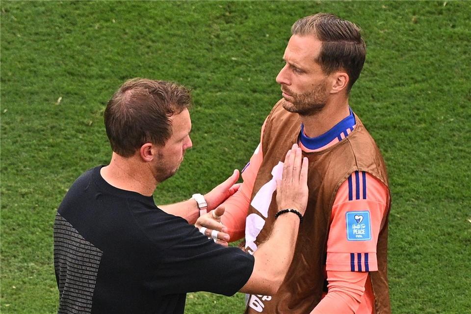 Haben alles geklärt: Ex-Bundestrainer Julian Nagelsmann (l) und Torwart Oliver Baumann. (Archivbild)Tom Weller/dpa