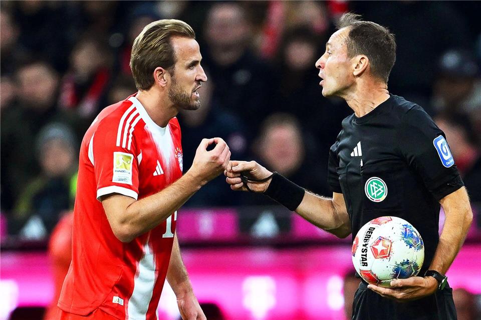 Harry Kane (l) war im Duell gegen den BVB überall im Einsatz.Sven Hoppe/dpa