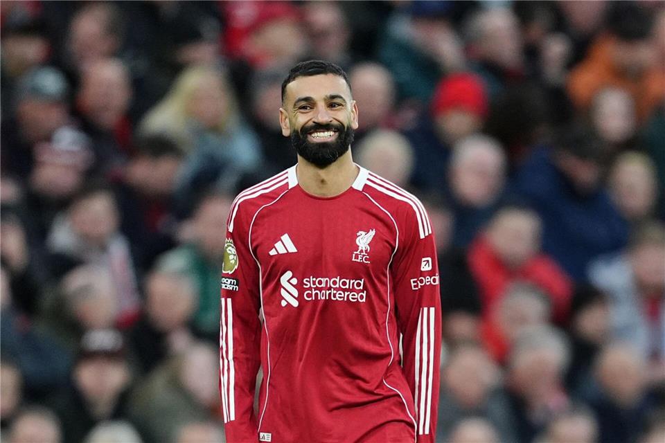 Hat wieder gut lachen: Mohamed SalahMartin Rickett/PA Wire/dpa