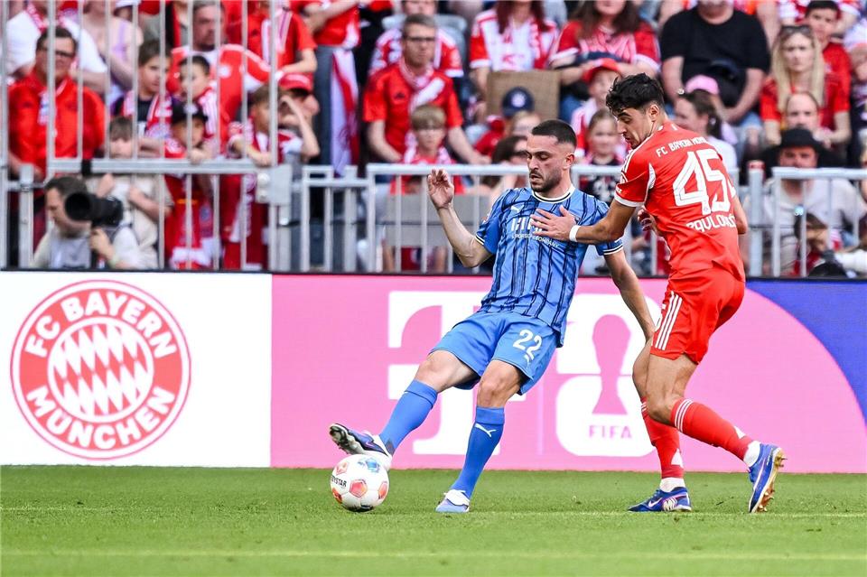 Hier noch Rivalen, bald wieder Teamkollegen bei den Bayern: Ibrahimovic (links) und Pavlovic (rechts). (Archivbild)Harry Langer/dpa