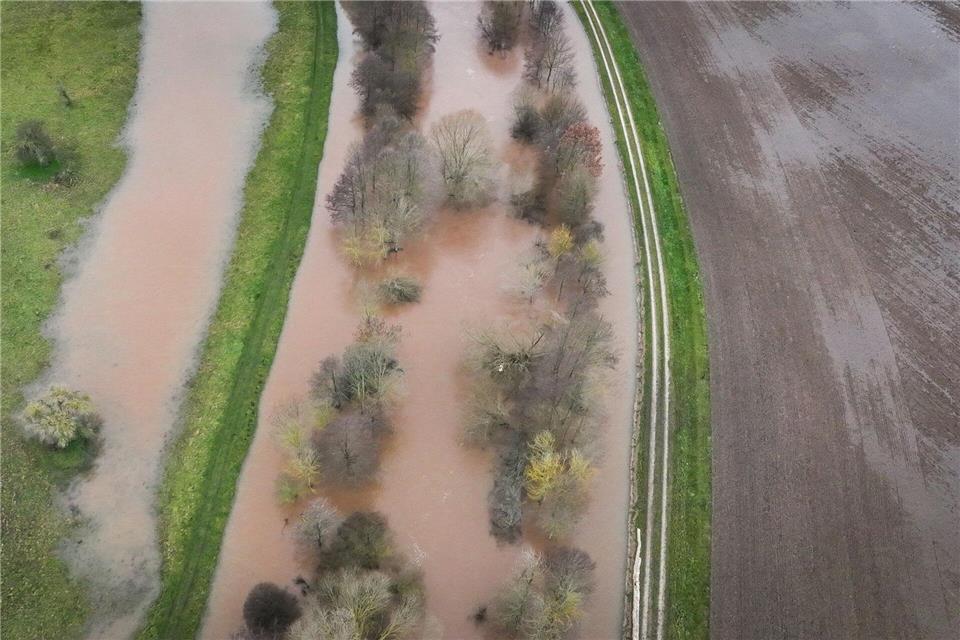Hochwasser und Starkregen - aber auch Hitze und Trockenheit: Das Land erwartet vermehrt Klimaextreme. (Archivbild)Heiko Rebsch/dpa