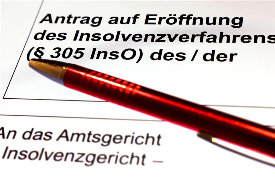 In Bayern gab es im ersten Halbjahr weniger Insolvenzen - bei Firmen stieg die Zahl allerdings stark an. (Symbolbild)Oliver Berg/dpa