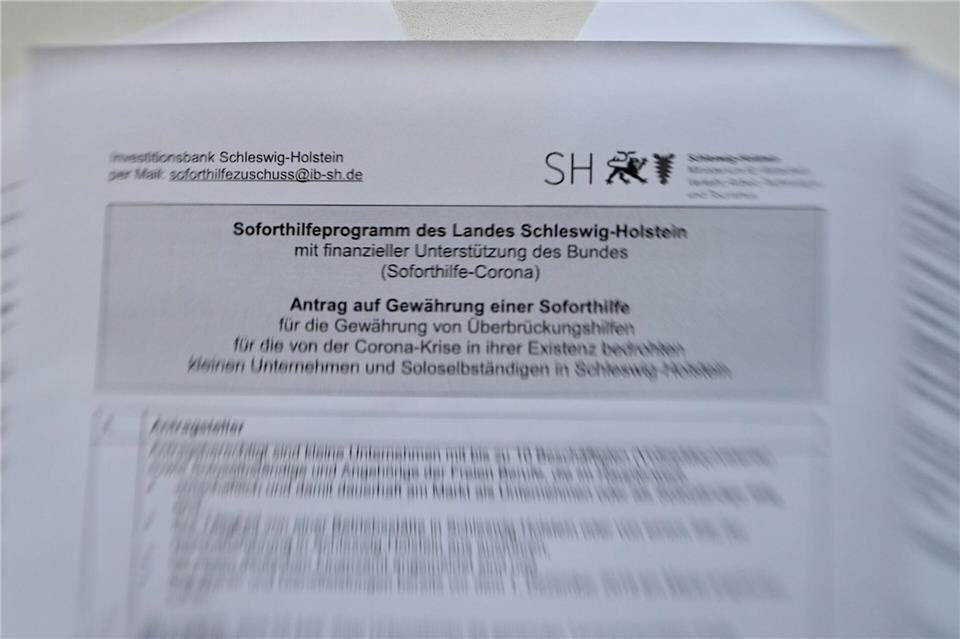 In Schleswig-Holstein sind noch knapp 300 Millionen Euro Rückforderungen für Corona-Hilfen offen. (Symbolbild)Carsten Rehder/dpa