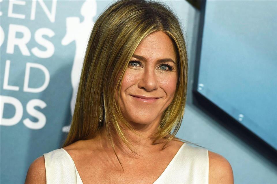 Jennifer Aniston lernt etwas Neues über ihre Kollegin und Freundin Reese Witherspoon. (Archivbild)Jordan Strauss/Invision/AP/dpa