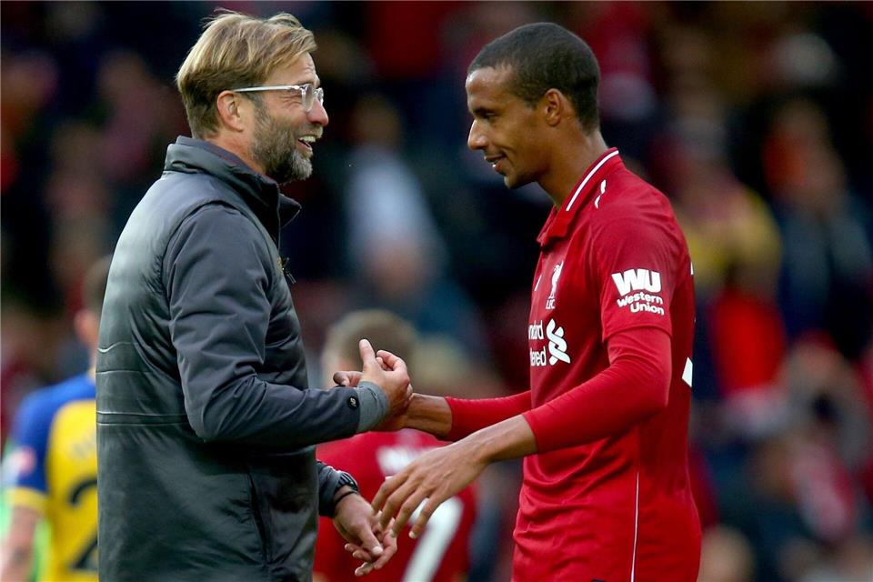 Joel Matip und sein damaliger Trainer Jürgen KloppDave Thompson/Press Association/dpa