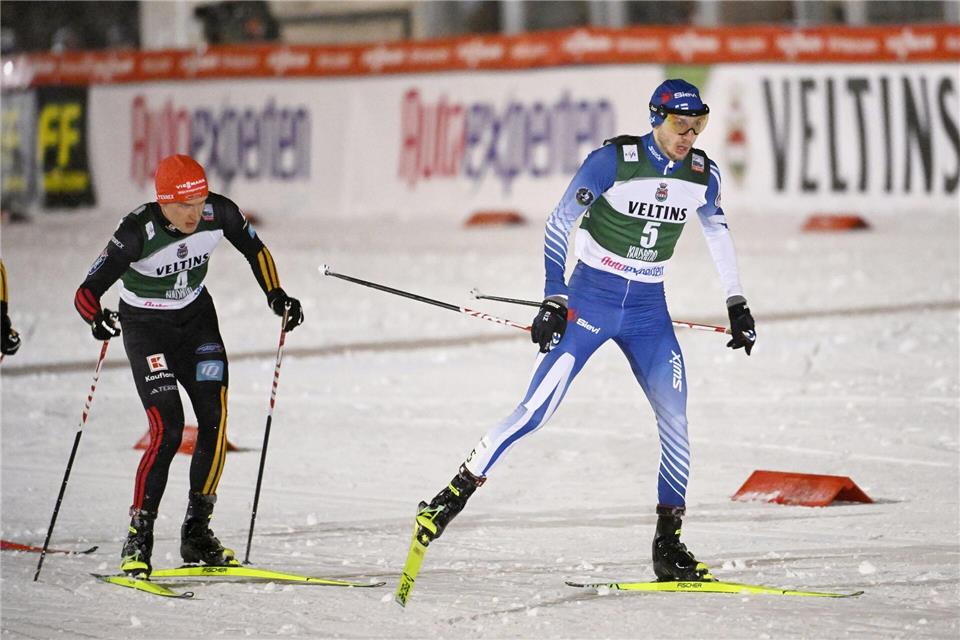 Julian Schmid (l) gab in der Loipe alles.Roni Rekomaa/Lehtikuva/dpa