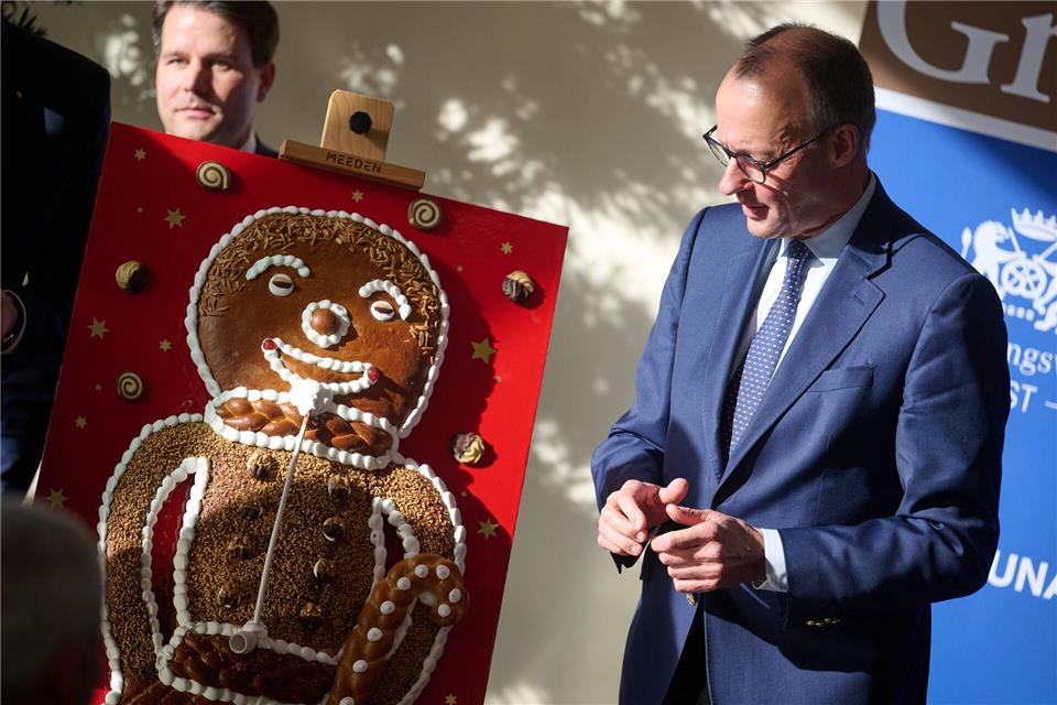 Kanzler Merz lobt das Bäckerhandwerk als Teil der deutschen Kultur.  Bernd Thissen/dpa