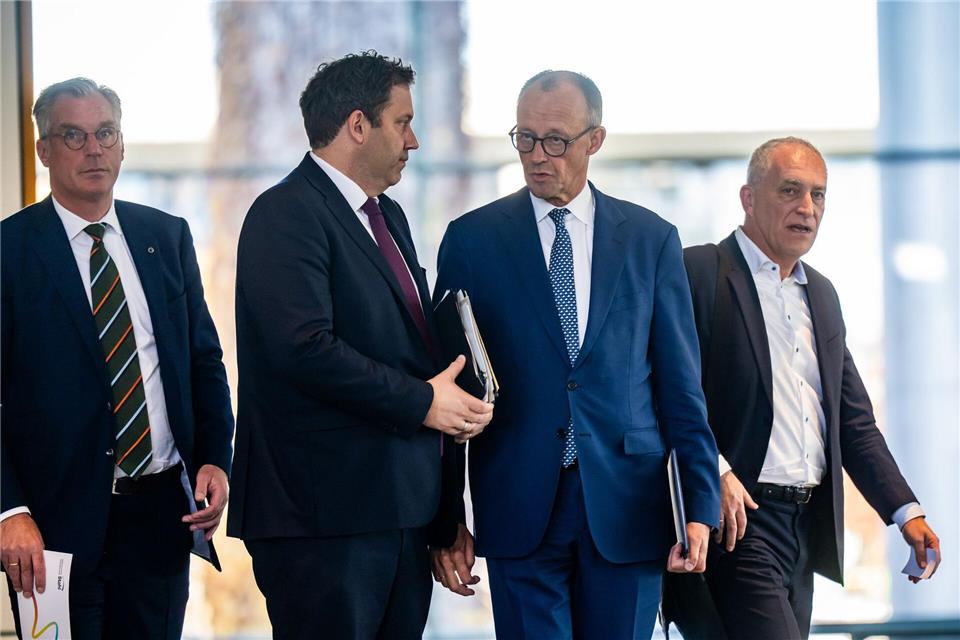 Kanzler und Vizekanzler an einer Seite.Michael Kappeler/dpa