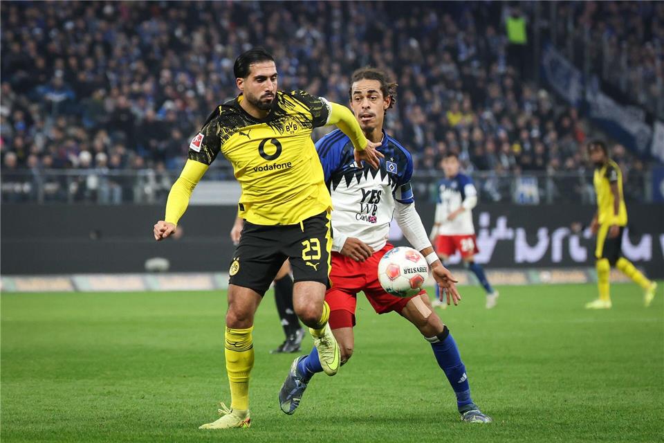 Kapitäne unter sich: Dortmunds Emre Can (l) und Yussuf Poulsen.Christian Charisius/dpa