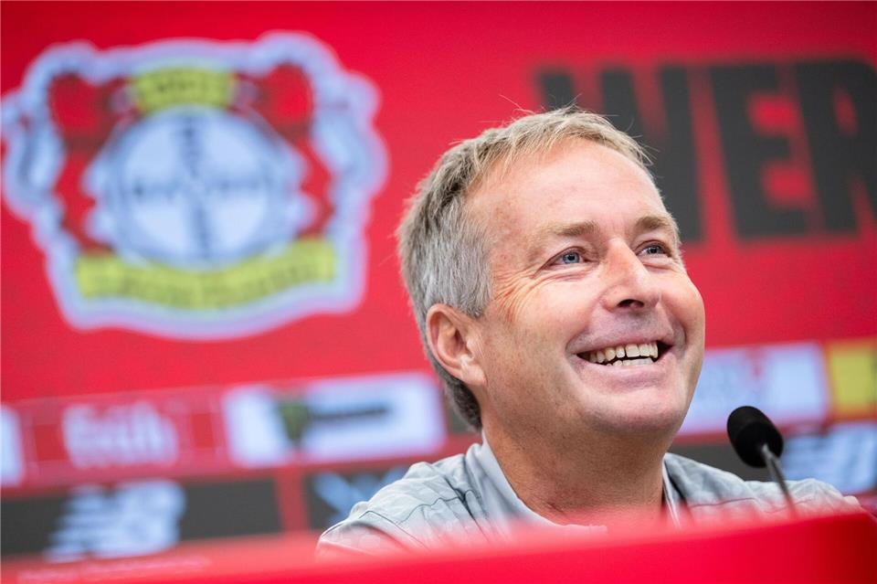 Kasper Hjulmand freut sich mit Christian Eriksen.Marius Becker/dpa