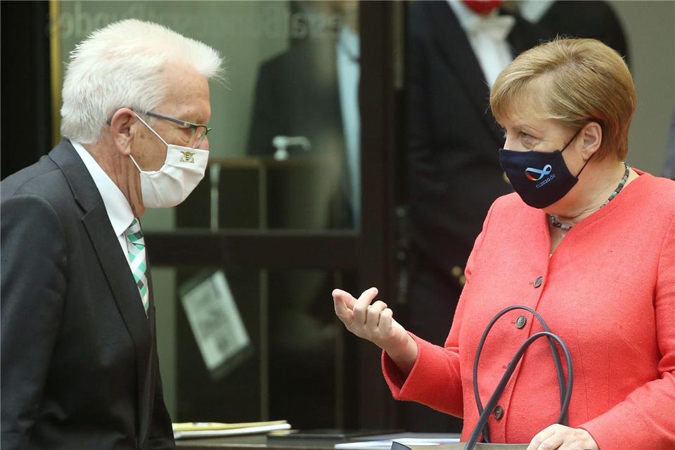 Können gut miteinander: Kretschmann und Merkel.Wolfgang Kumm/dpa