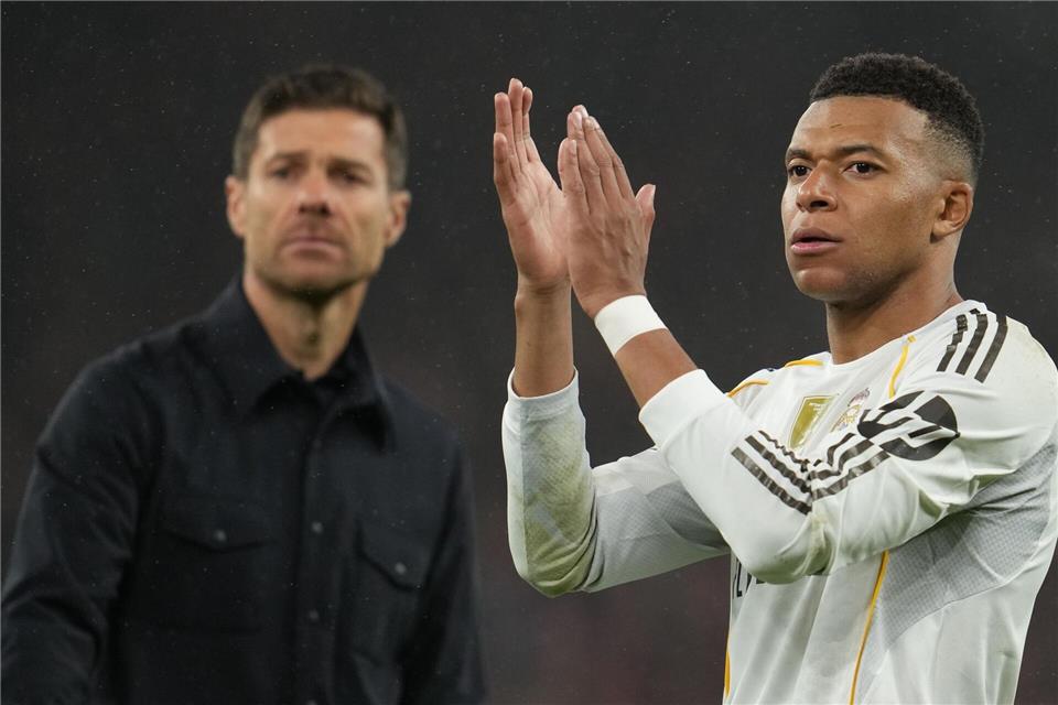 Kylian Mbappé (r) hat sich mit Respekt von seinem bisherigen Trainer Xabi Alonso verabschiedet. (Archivbild)Jon Super/AP/dpa