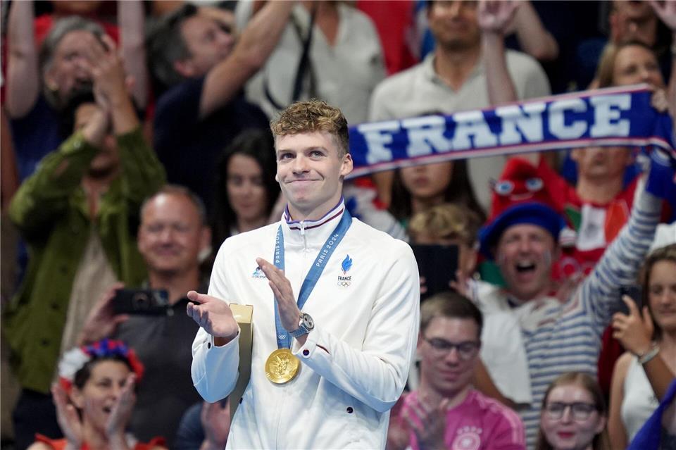 Léon Marchand wurde bei den Olympischen Spielen frenetisch gefeiert. (Archivbild)Marcus Brandt/dpa
