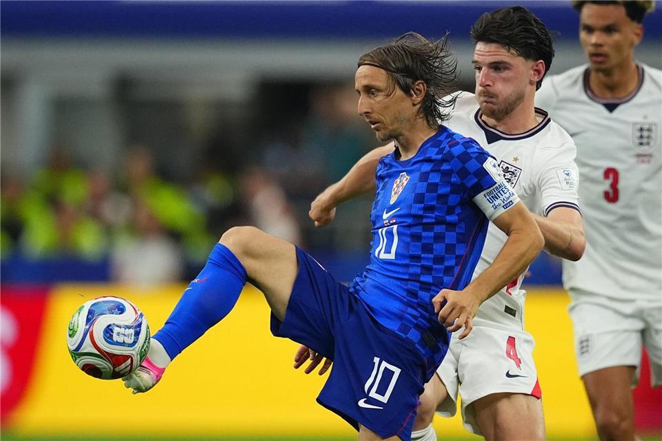 Luka Modric (l) erlebte einen WM-Start zum Vergessen.Julio Cortez/AP/dpa