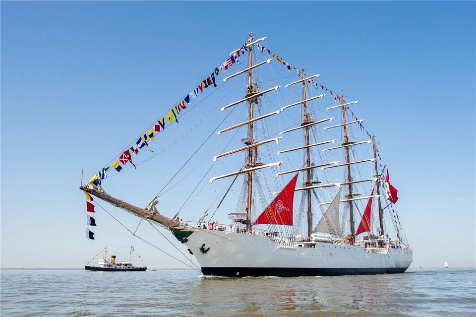 Manche Besatzungen segelten für die „Sail“ um die halbe Welt.Hauke-Christian Dittrich/dpa