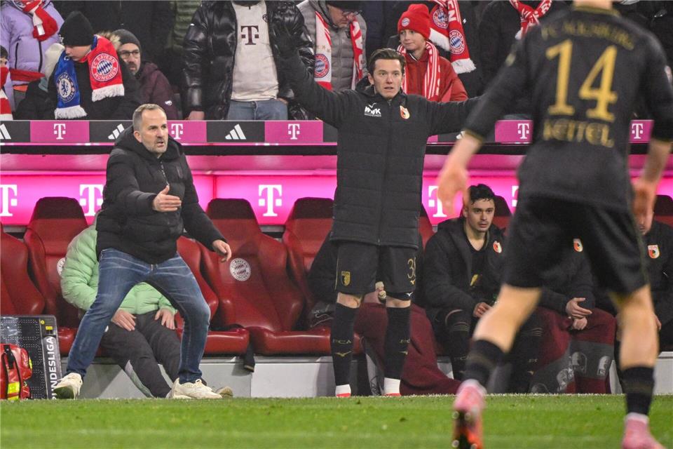Manuel Baum (l) zeigt vollen Körpereinsatz.Peter Kneffel/dpa