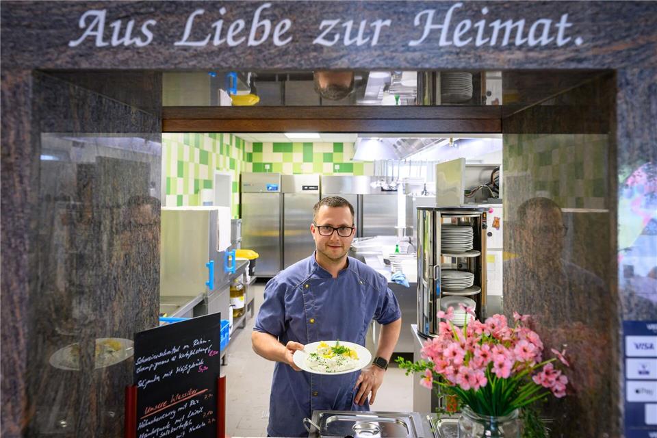 Martin Grunewald setzt auf die Kombination von Laden und Gastronomie.Patrick Pleul/dpa